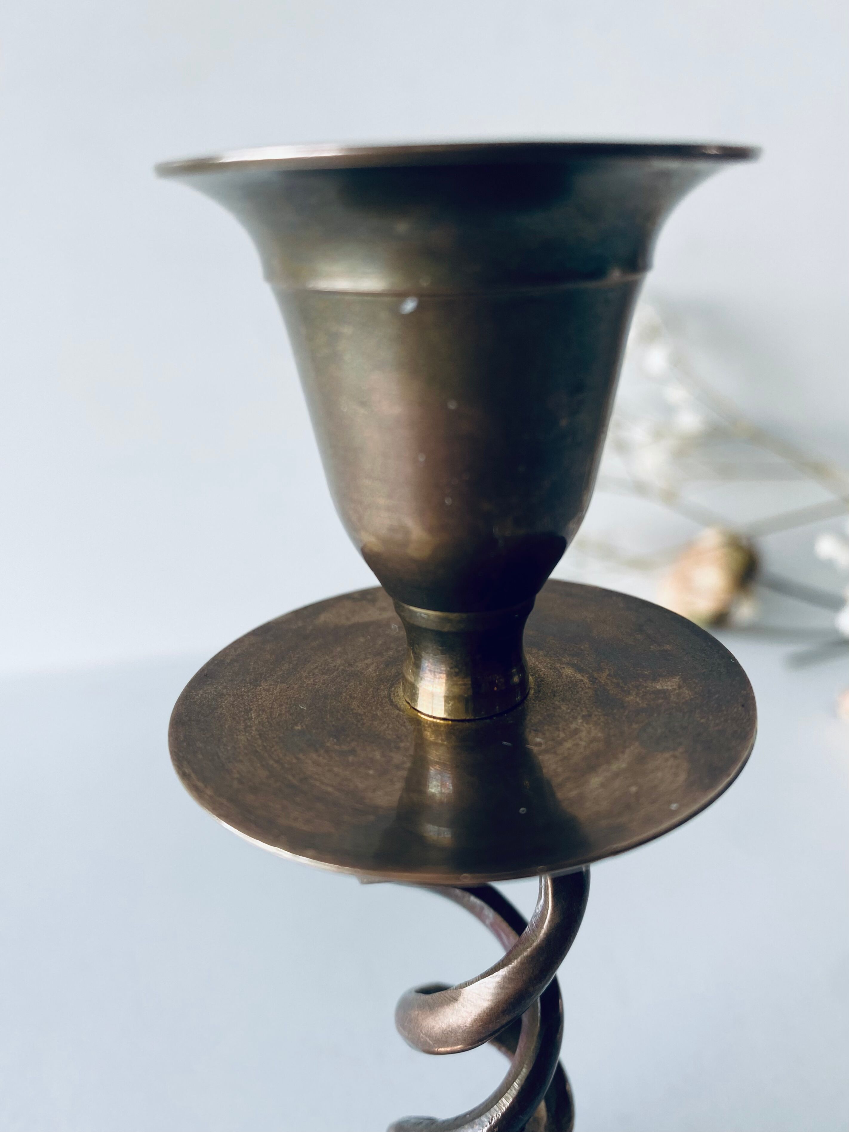 Twisted brass candle holder