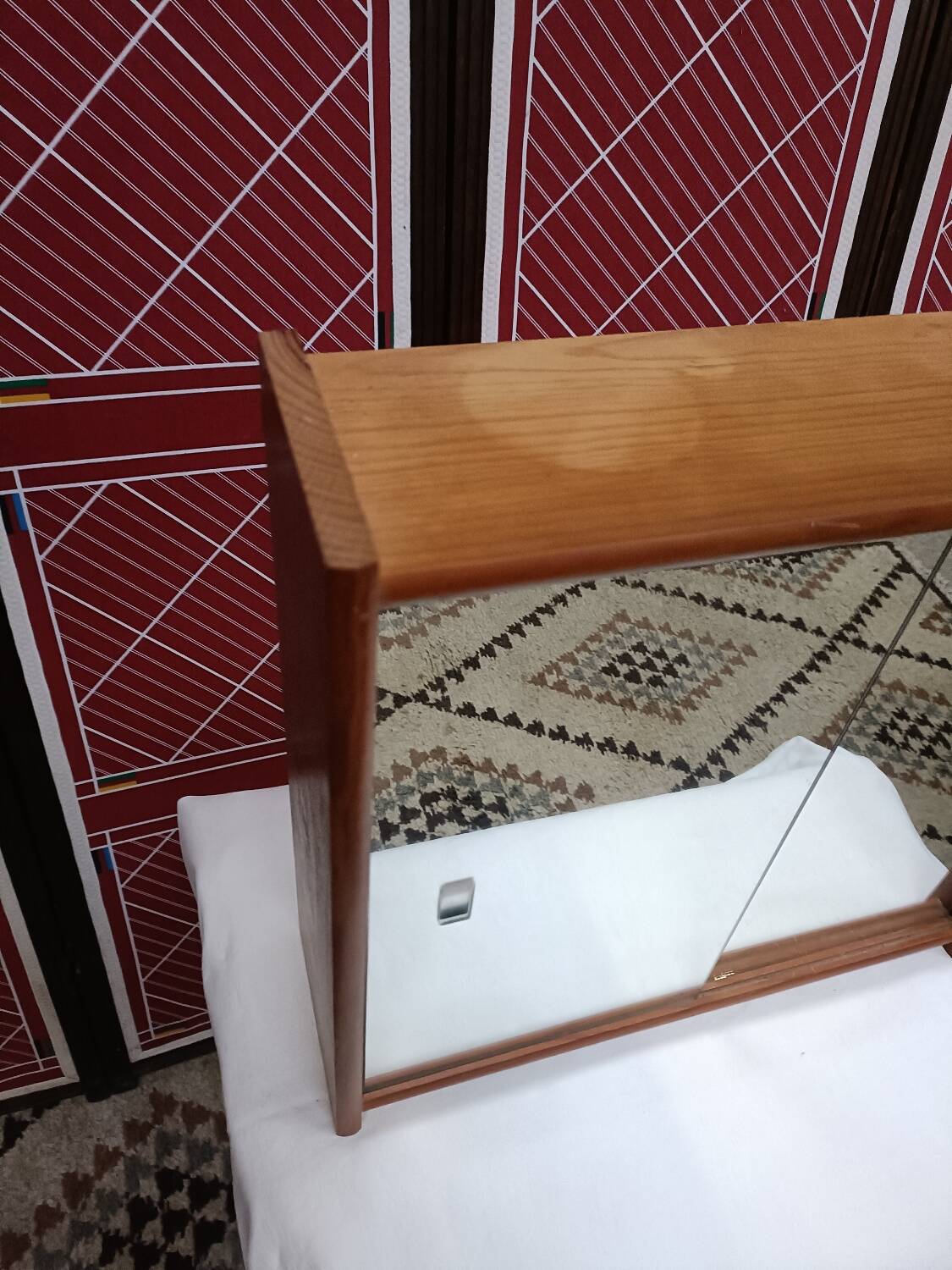 Small wall-mounted bathroom cabinet with vintage mirror doors