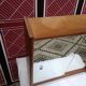 Small wall-mounted bathroom cabinet with vintage mirror doors