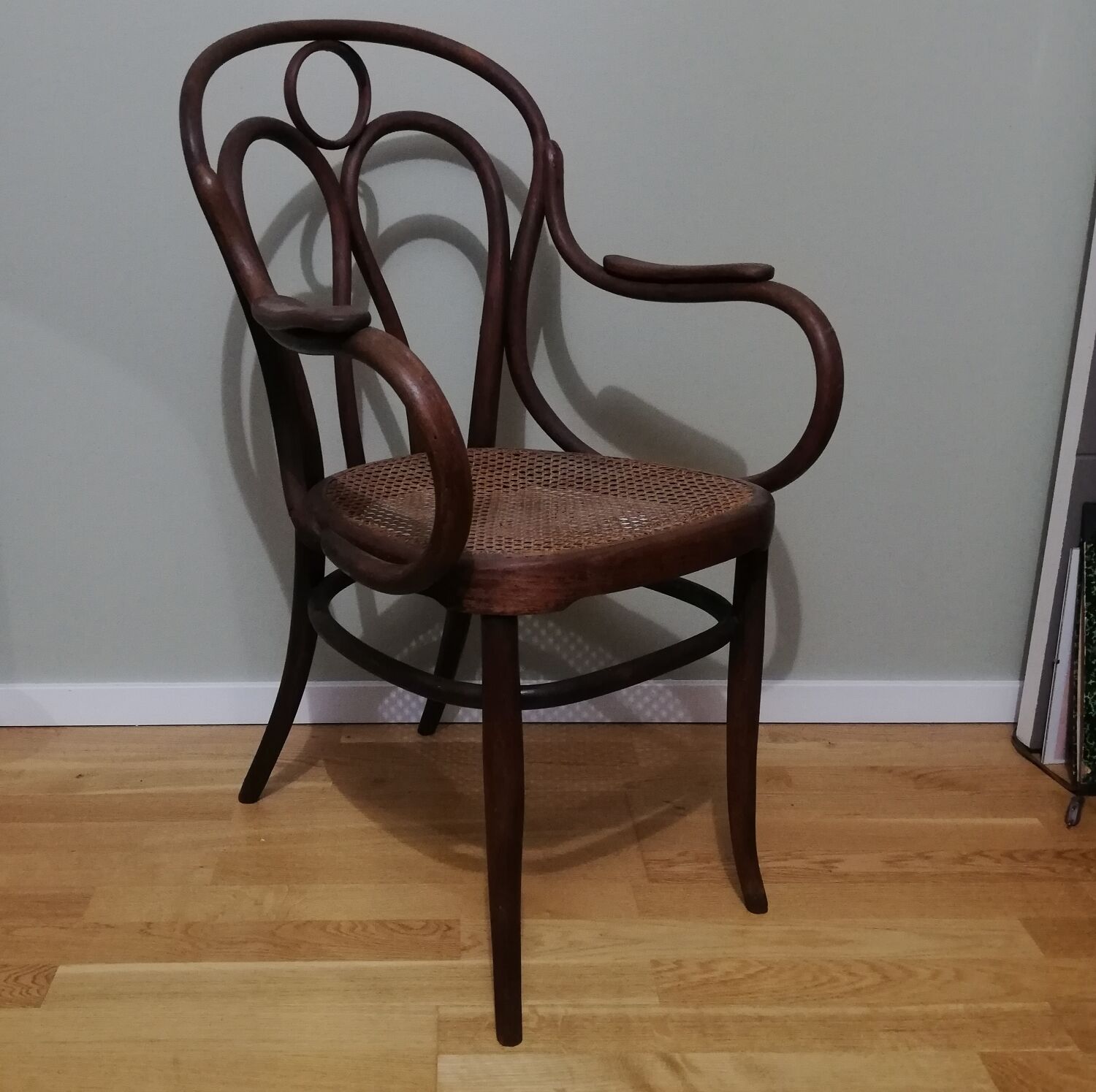 Canned armchair in curved wood signed J.Kohn