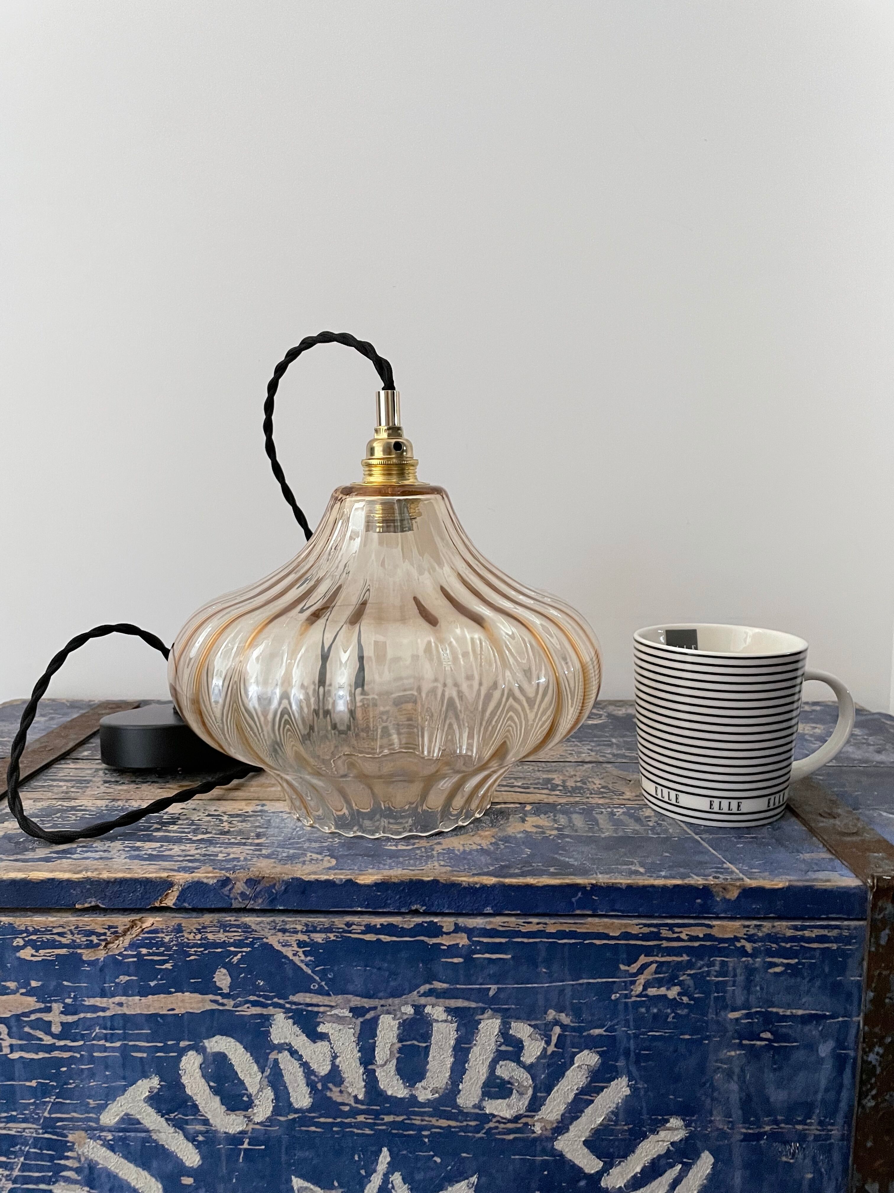 Vintage suspension lamp in electrified amber glass to nine