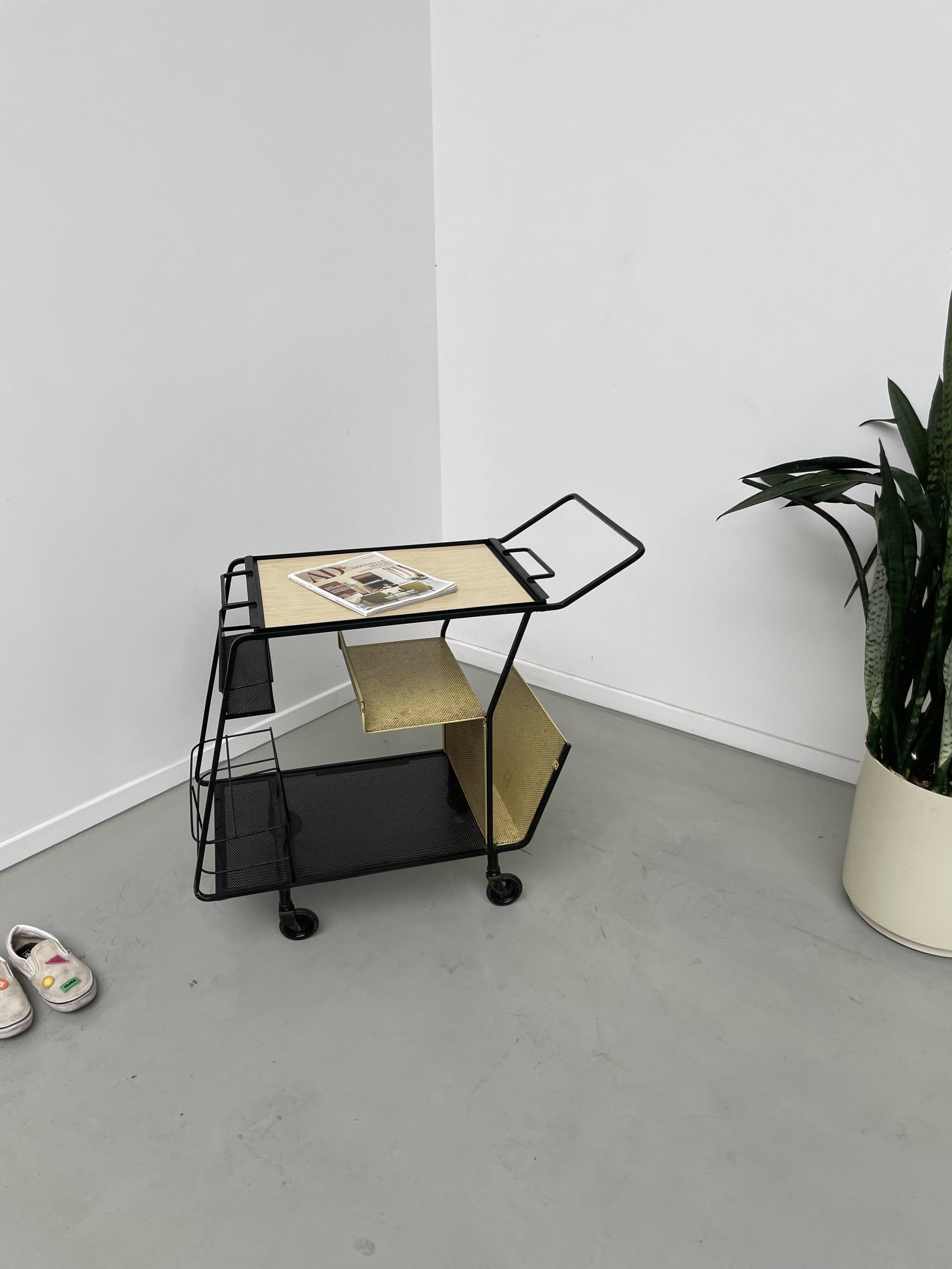 Perforated metal serving trolley in the Mathieu Matégot style