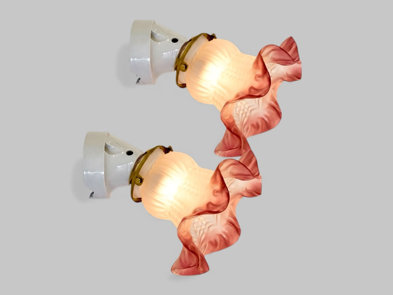 Pair of porcelain wall lights with pink glass tulips, Art Deco.