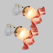 Pair of porcelain wall lights with pink glass tulips, Art Deco.
