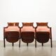 Three vintage cinema or theatre armchairs