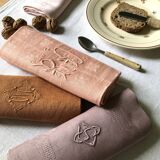 Set of four old damask towels dyed in multiple colors