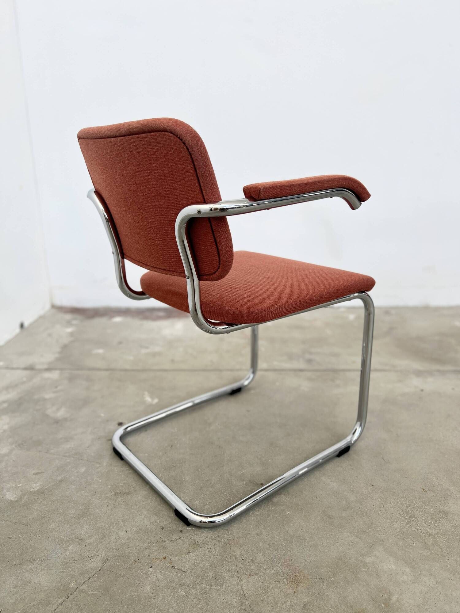 Pair of Marcel Breuer B64 Knoll armchairs in coral fabric