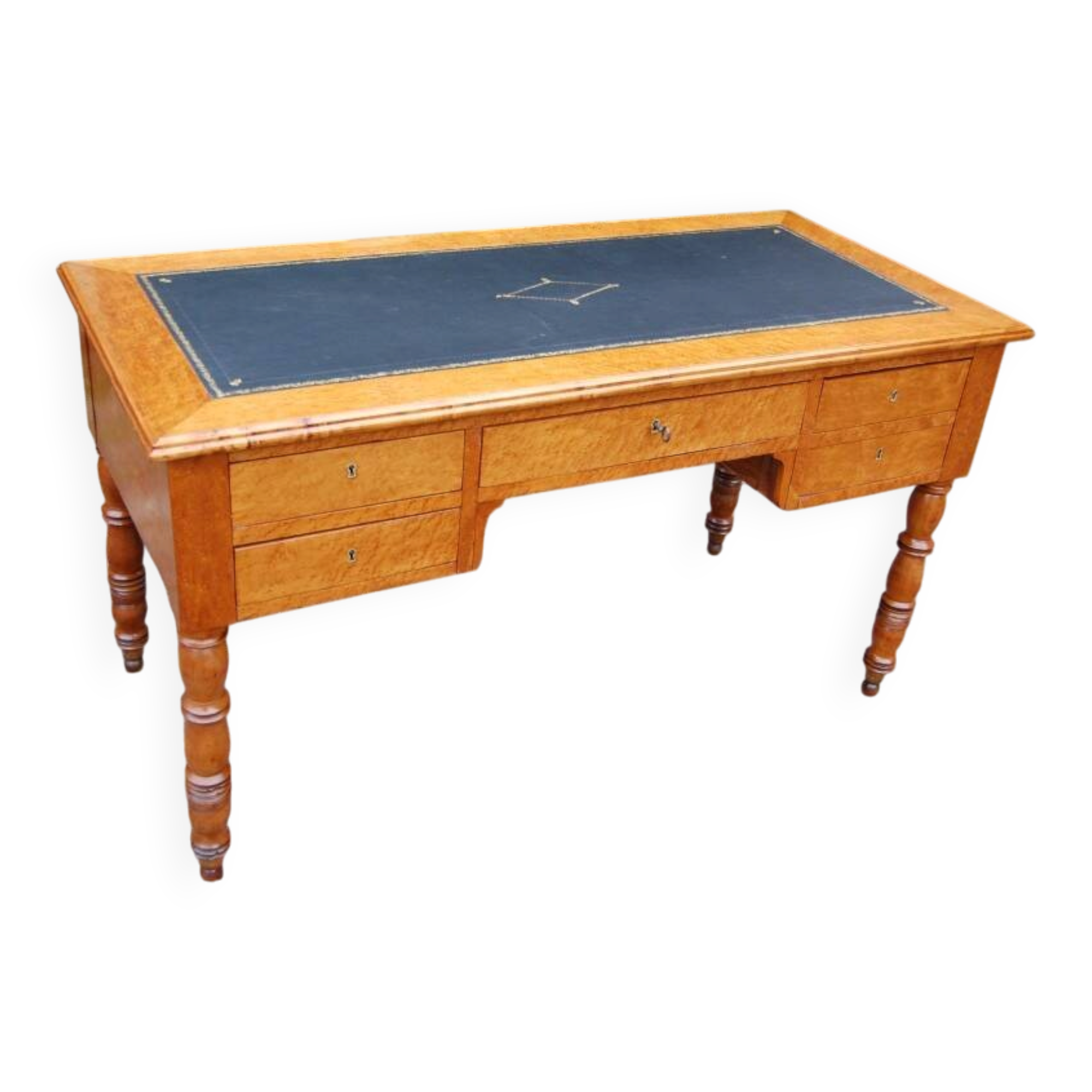 Louis Philippe period desk in mottled maple and cherry, 19th century.