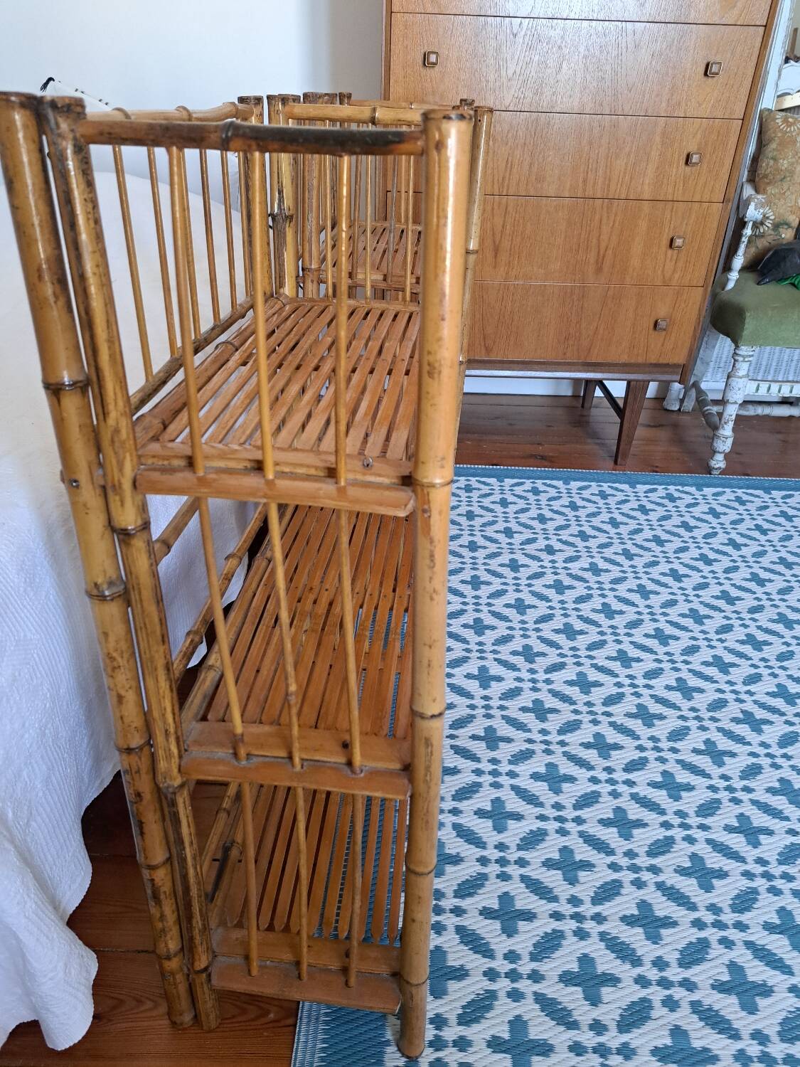 Pair of folding bamboo shelves