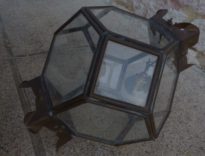 Old lantern in brass and glass with 8 facets or 24 stained glass windows