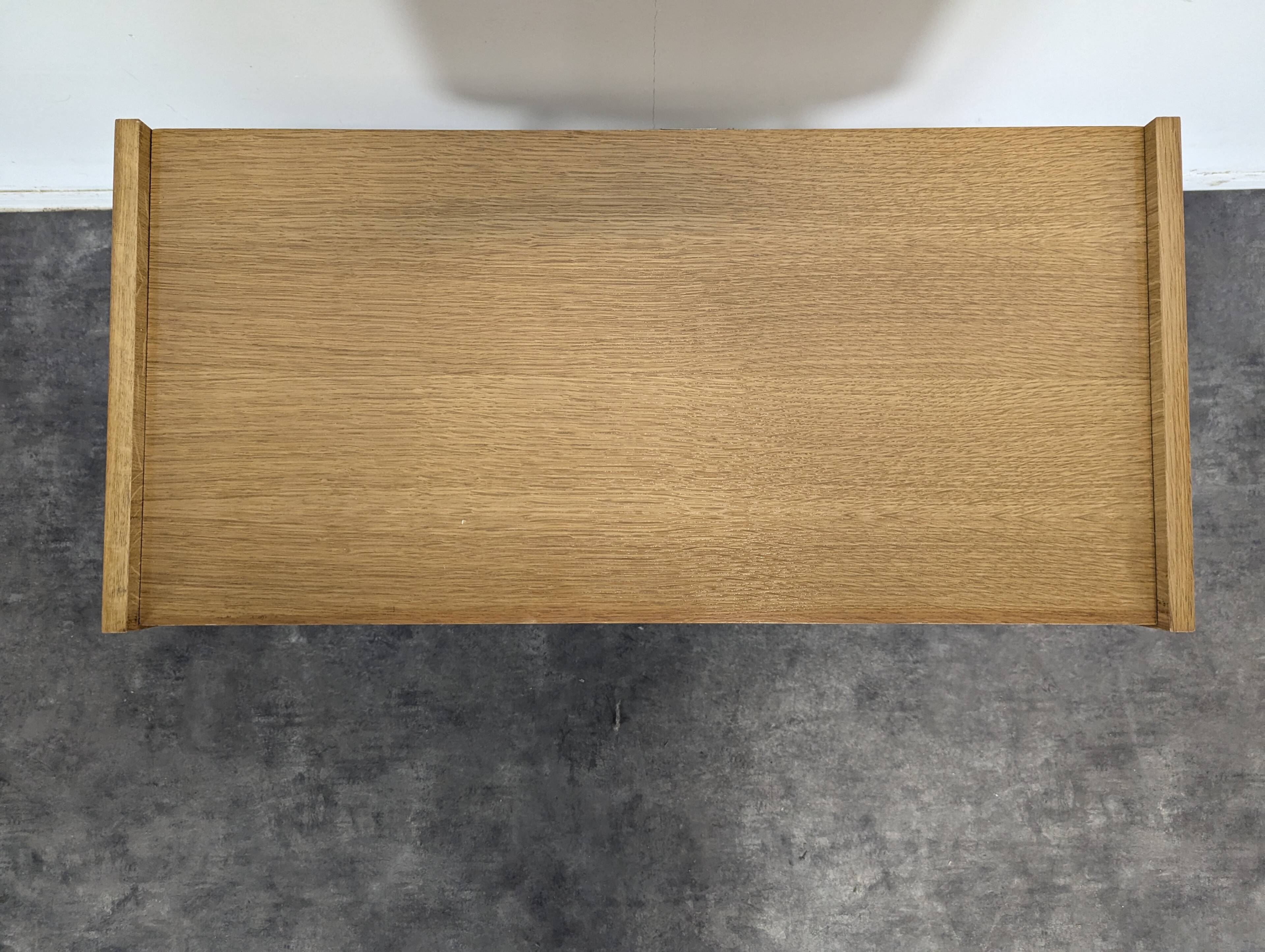 Modernist sideboard with 2 doors in oak veneer.