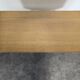 Modernist sideboard with 2 doors in oak veneer.
