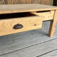Table basse en bois brut