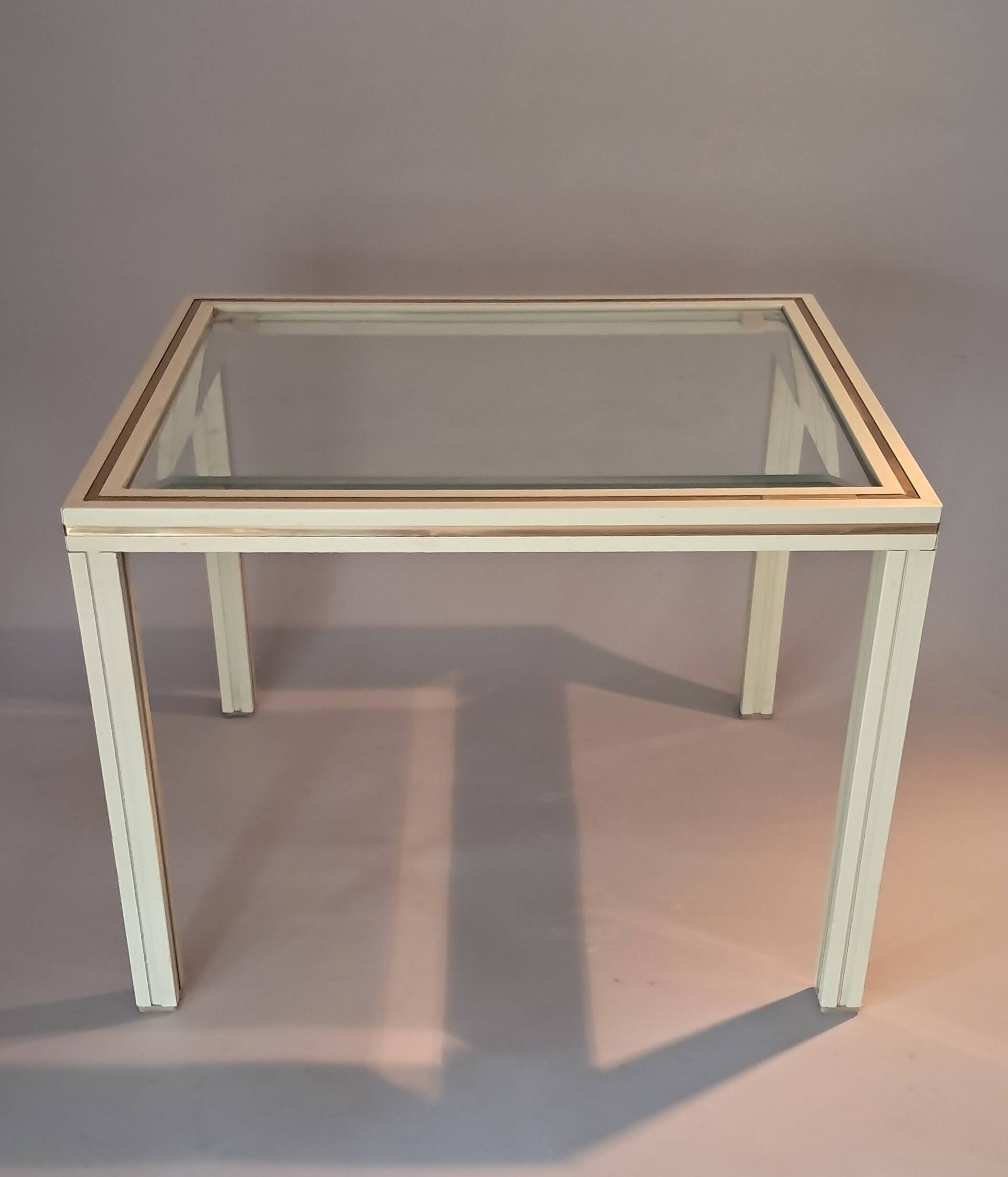 White lacquered side table by Pierre Vandel with gold brass.