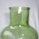 Bouteille vintage en verre bullé vert