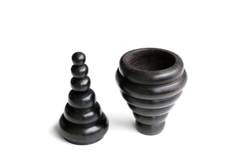 Sculptural ebony box shot, 70s