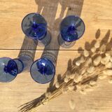 Champagne flutes in blue glass
