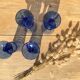 Champagne flutes in blue glass