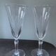 2 antique blown glass champagne flutes, tulip shape.