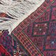 Vintage hand-knotted Persian Baluch prayer rug from the 1940s.