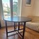 Extendable drop-leaf table for 2 to 5 people - vintage lacquered wood in black