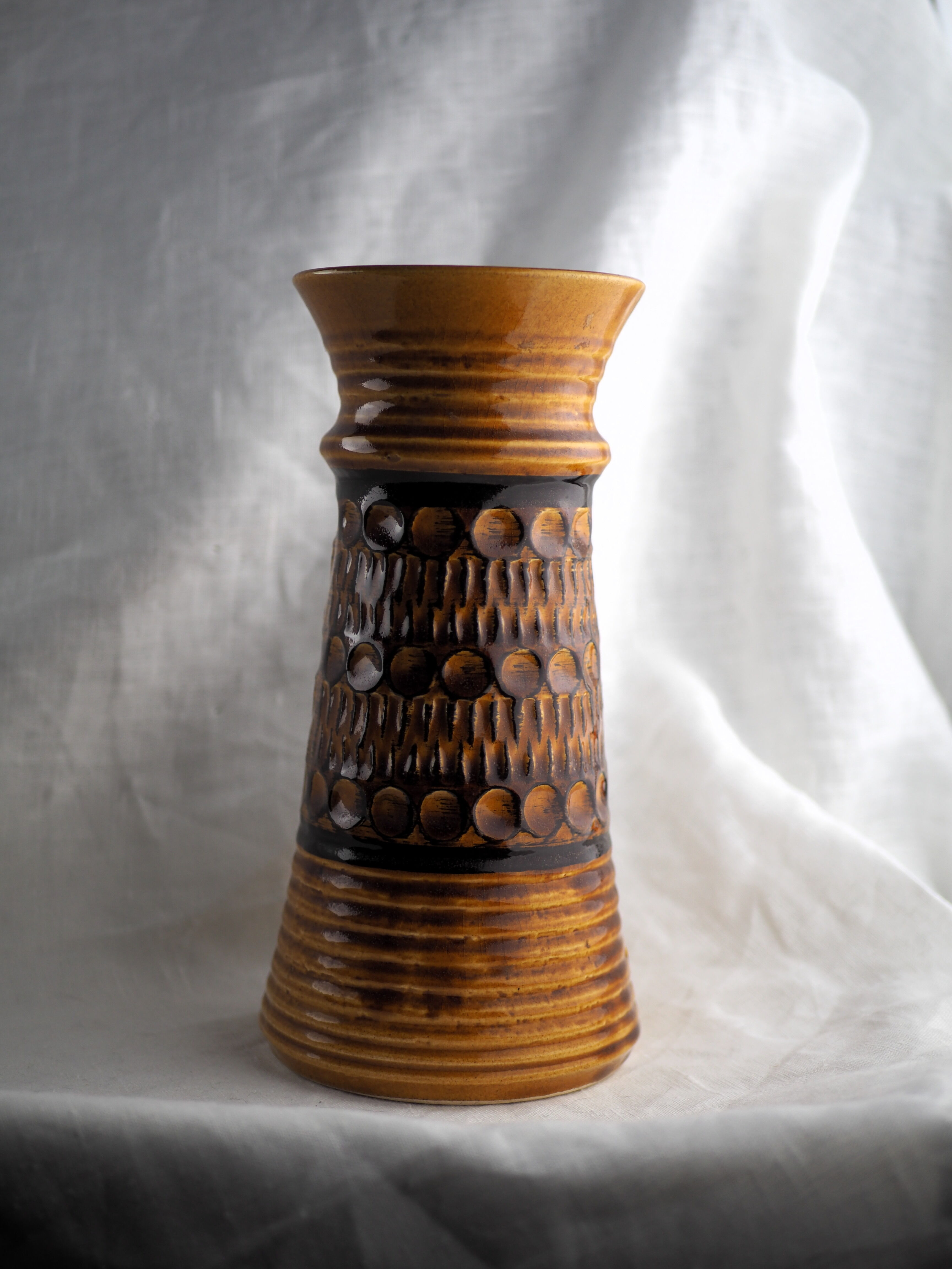 High arched vase, round hollow patterns and spikes, black and ocher seventies vibe - Bay Keramik - 70'