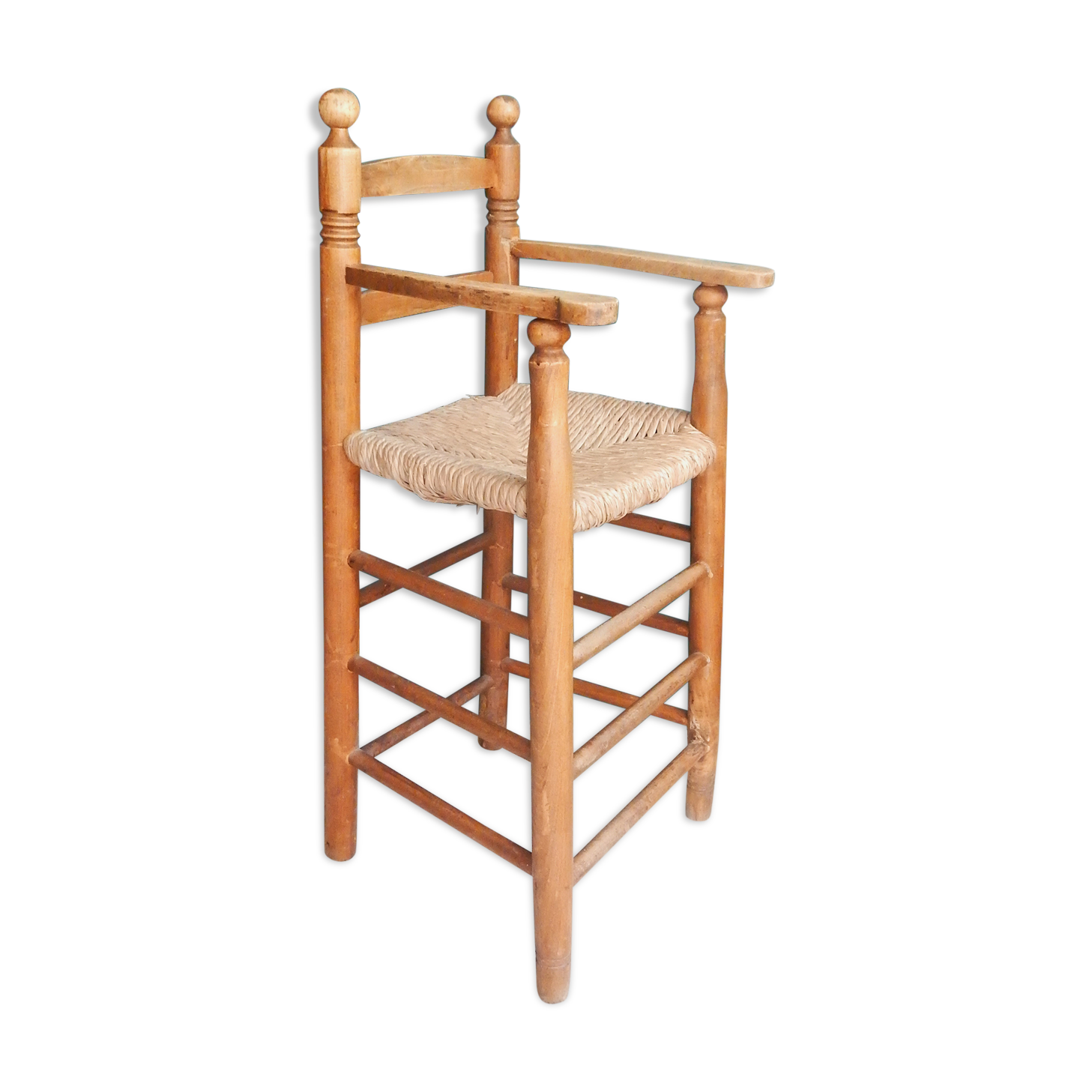 Children's high chair made of wood and straw