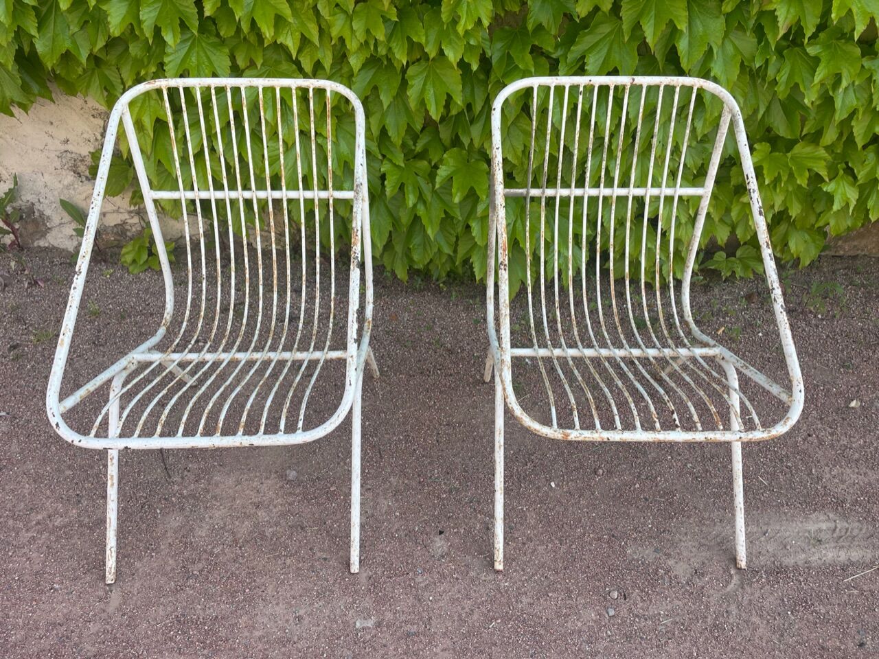 Pair of wrought iron armchairs year 60