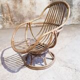 Antique swivel rattan armchair