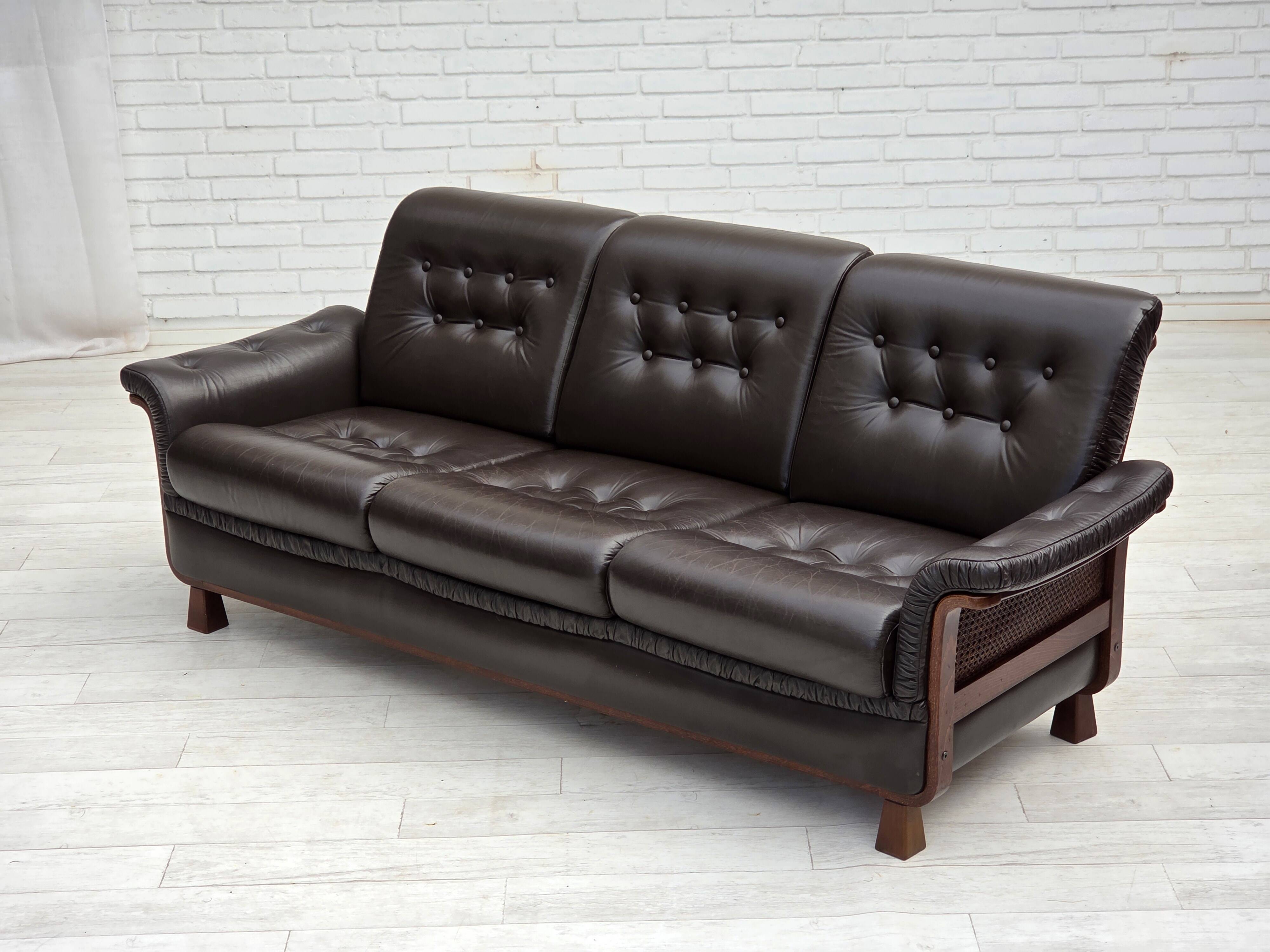 1970s, Scandinavian 3-seater sofa, furniture leather, teak wood legs.