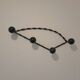 Antique design wall hook in wrought iron and painted wood.