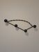 Antique design wall hook in wrought iron and painted wood.