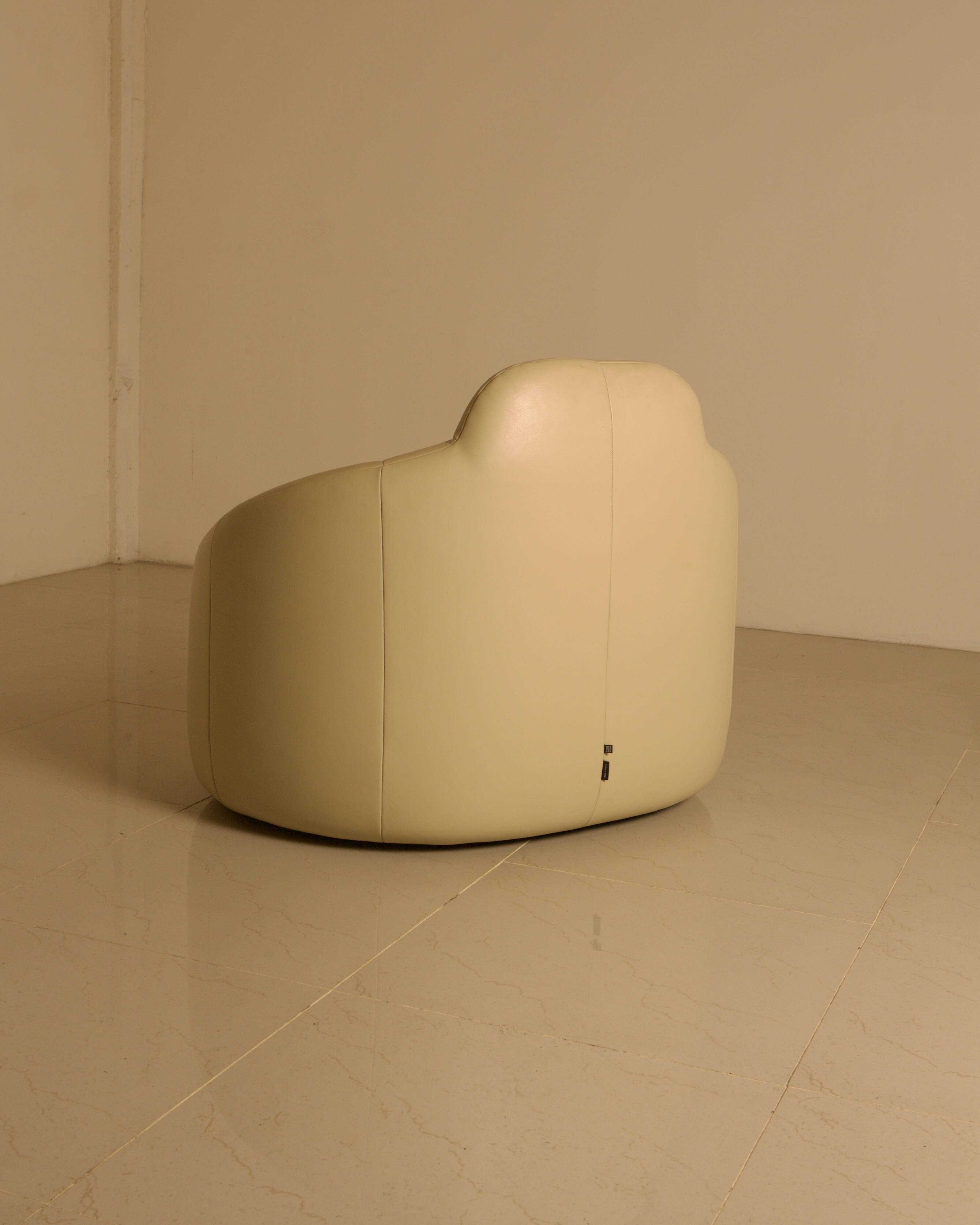 "Pumpkin" armchair set and its cream leather ottoman by Pierre Paulin