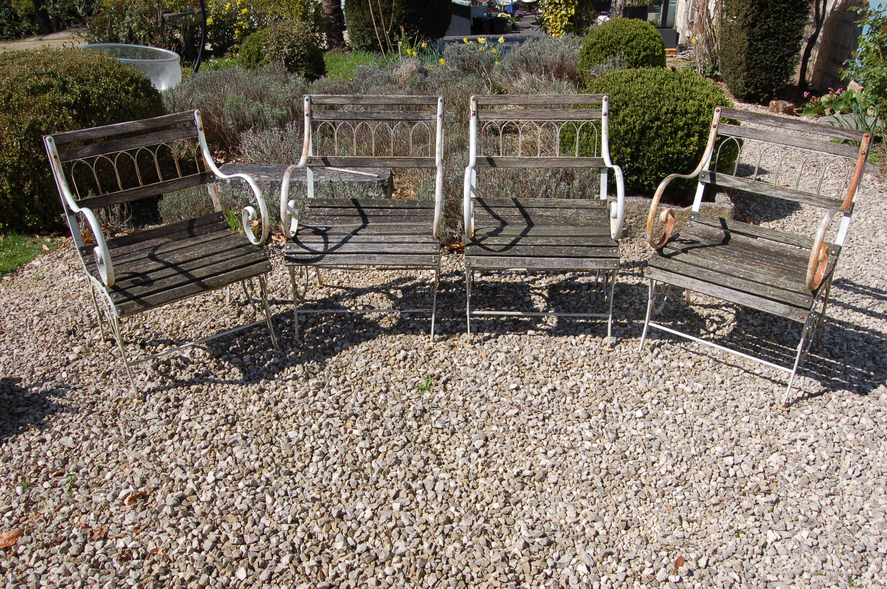 4 20TH CENTURY PAINTED WOOD AND METAL GARDEN CHAIRS