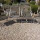 4 20TH CENTURY PAINTED WOOD AND METAL GARDEN CHAIRS