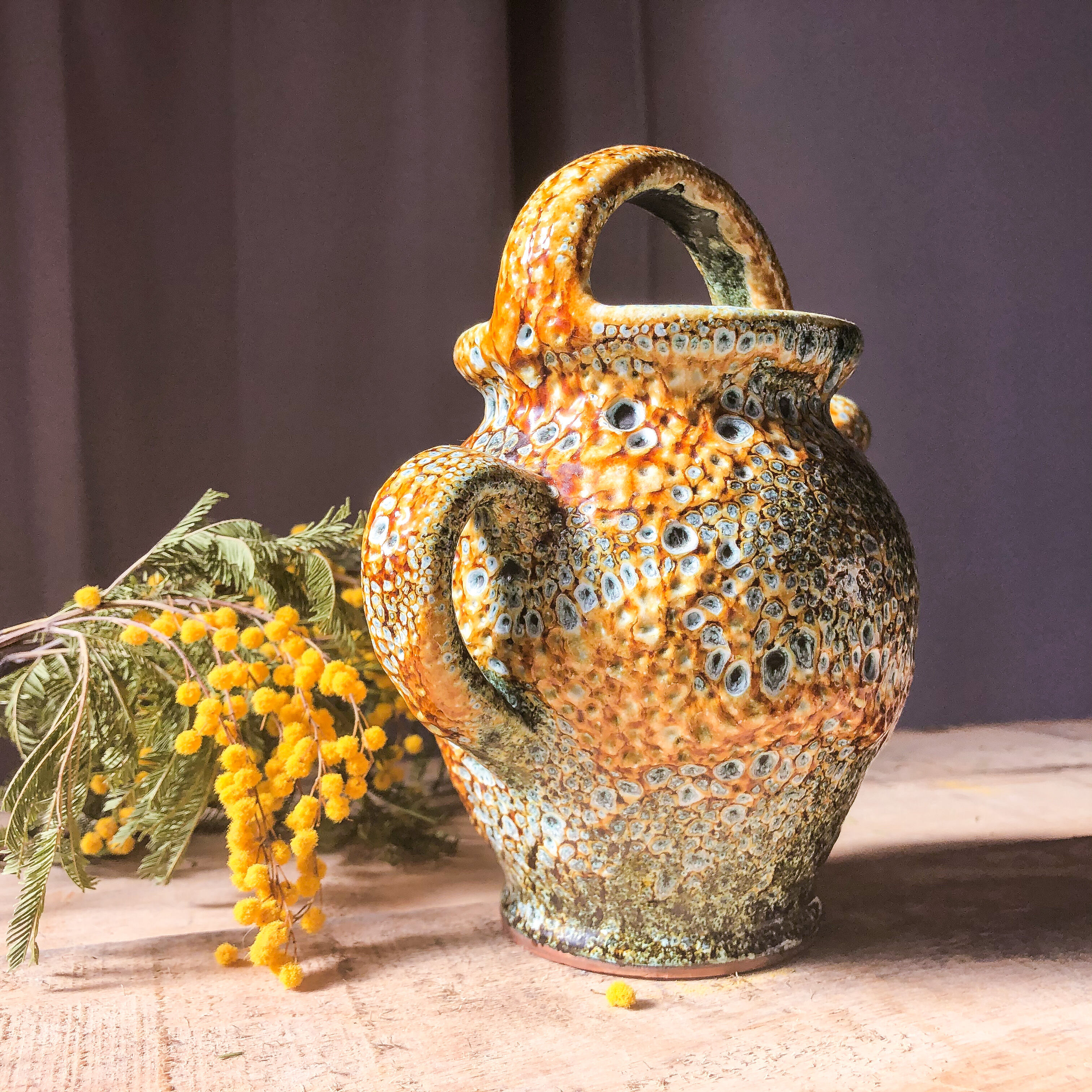 Enamelled terracotta pitcher