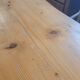 Large bistro table with a wooden top and cast iron legs - 2m56