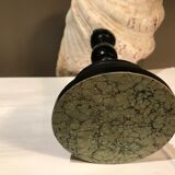 Clam mounted in vacuum pocket