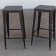 Pair of black metal stools