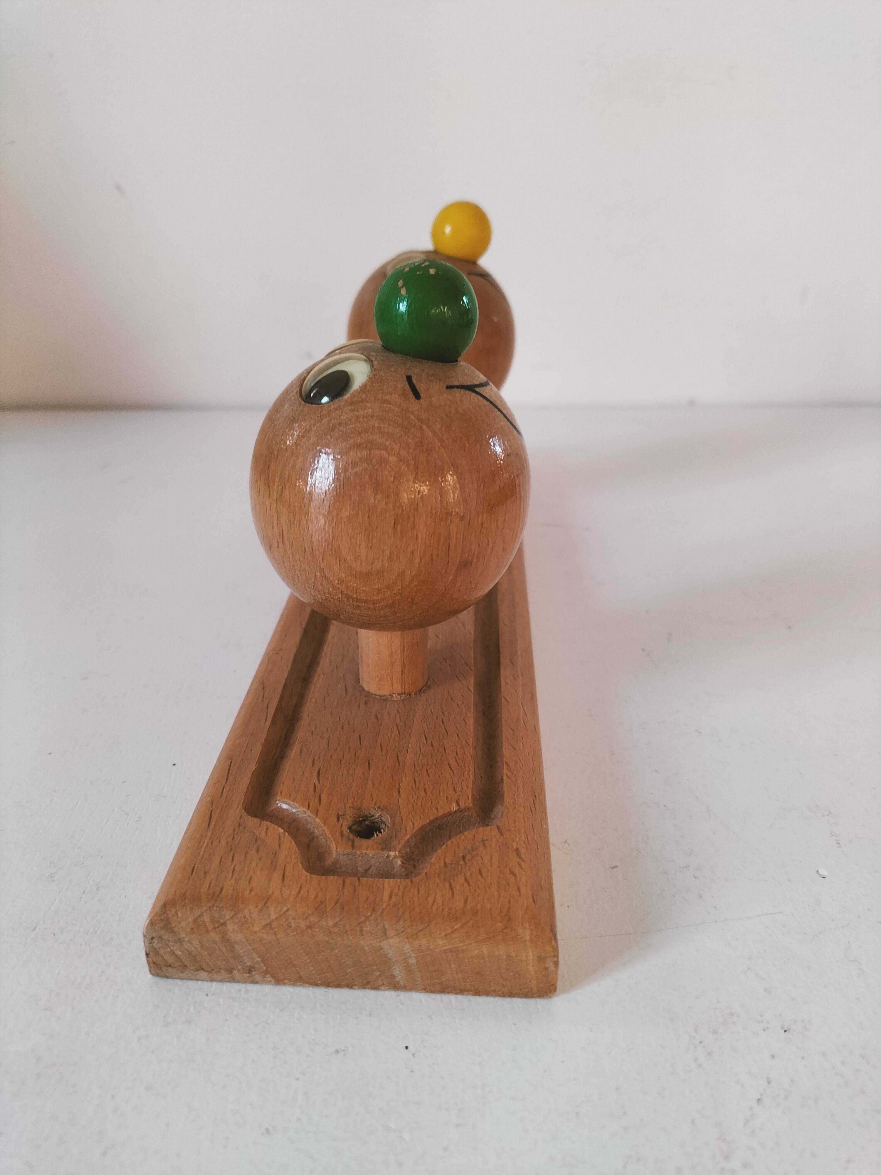 Vintage wooden children's coat rack - smiling heads hooks