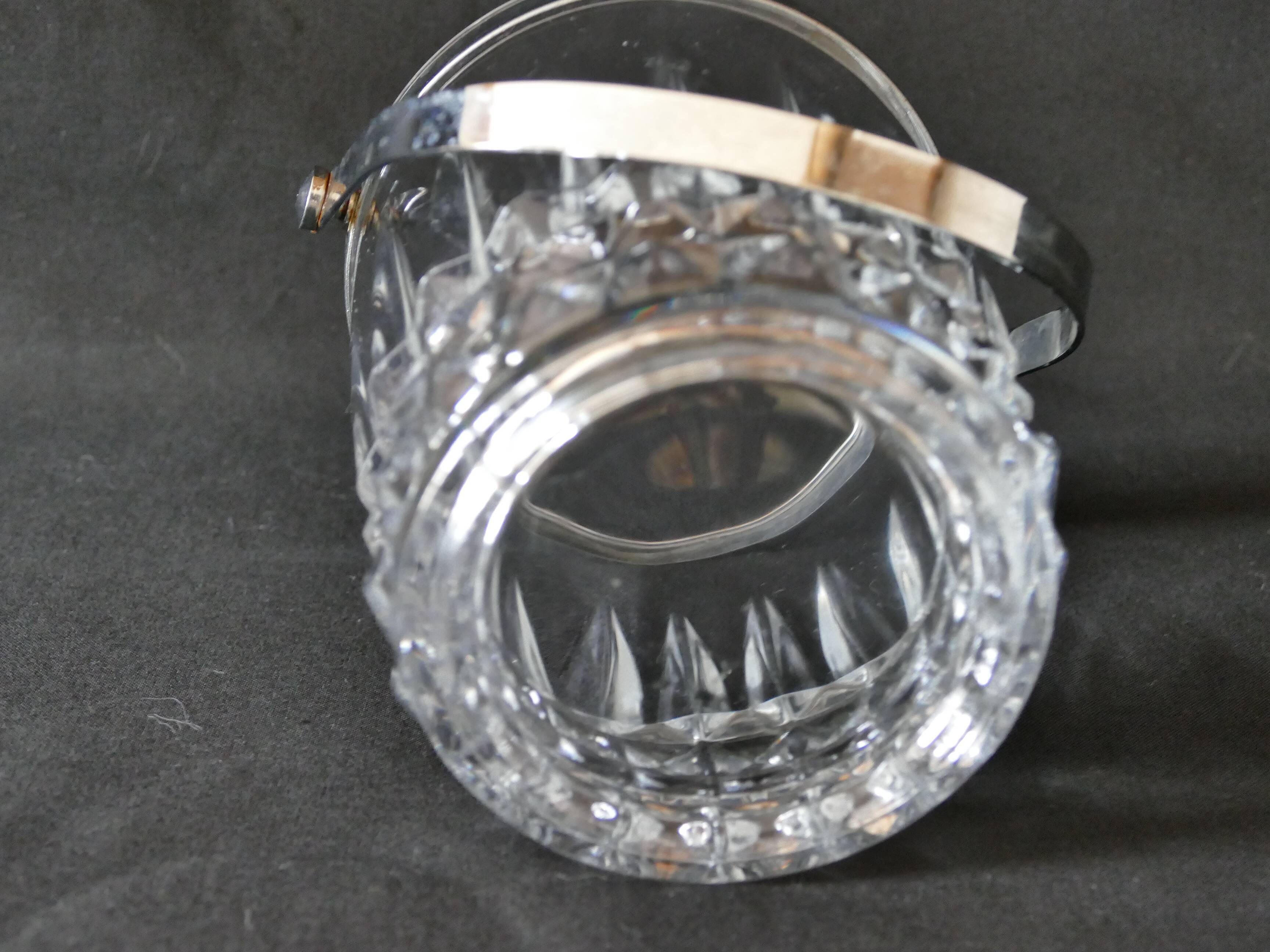 Vintage glass ice bucket stamped with a metal handle
