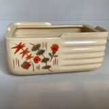 Art Deco planter with stencilled flower motif