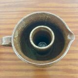 Large antique brown glazed stoneware jug with cork stopper.