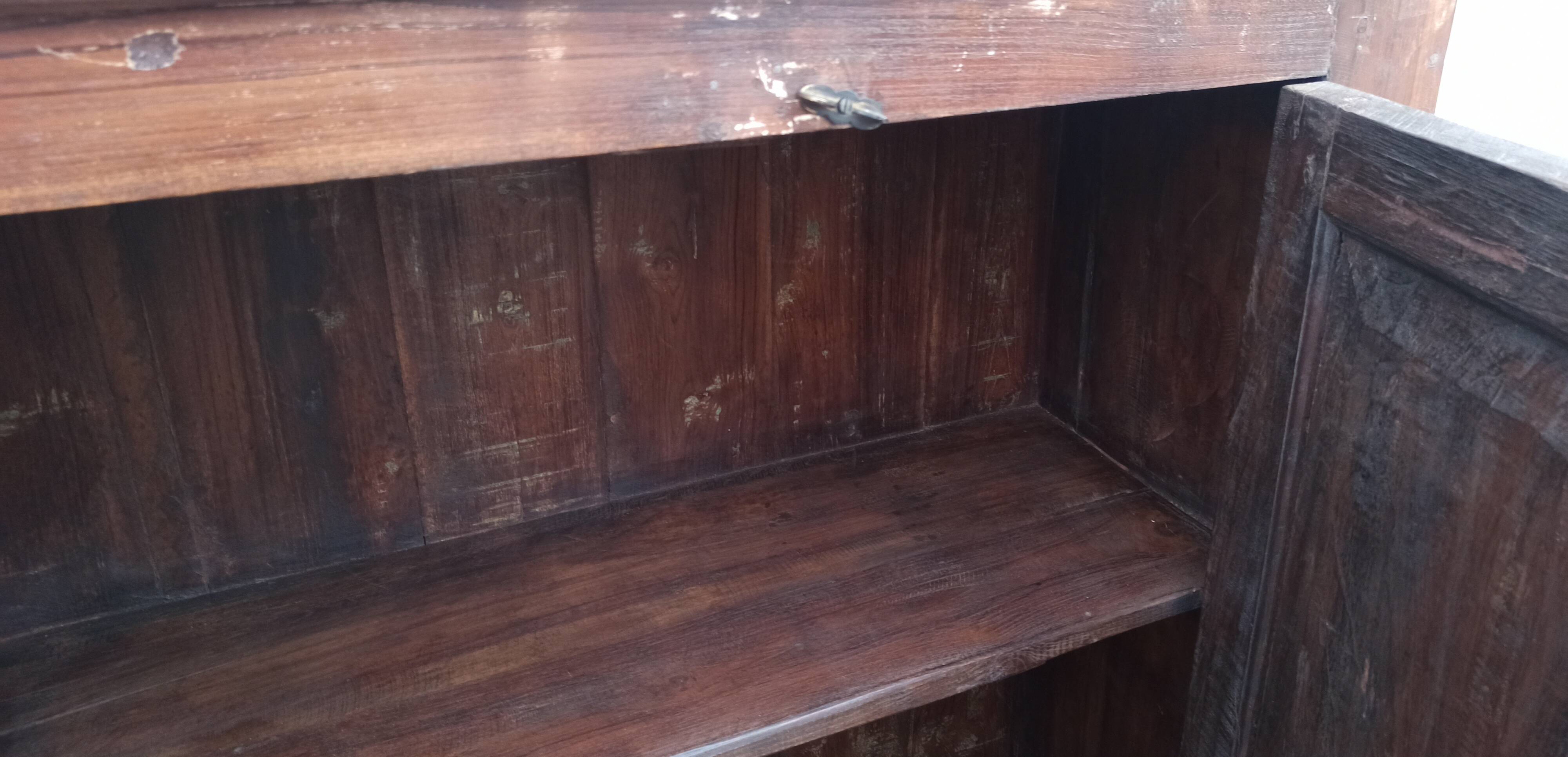 Old wooden cabinet with ceramic handles