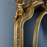 Grand miroir style Louis XV en bois sculpté et doré, XIXe siècle