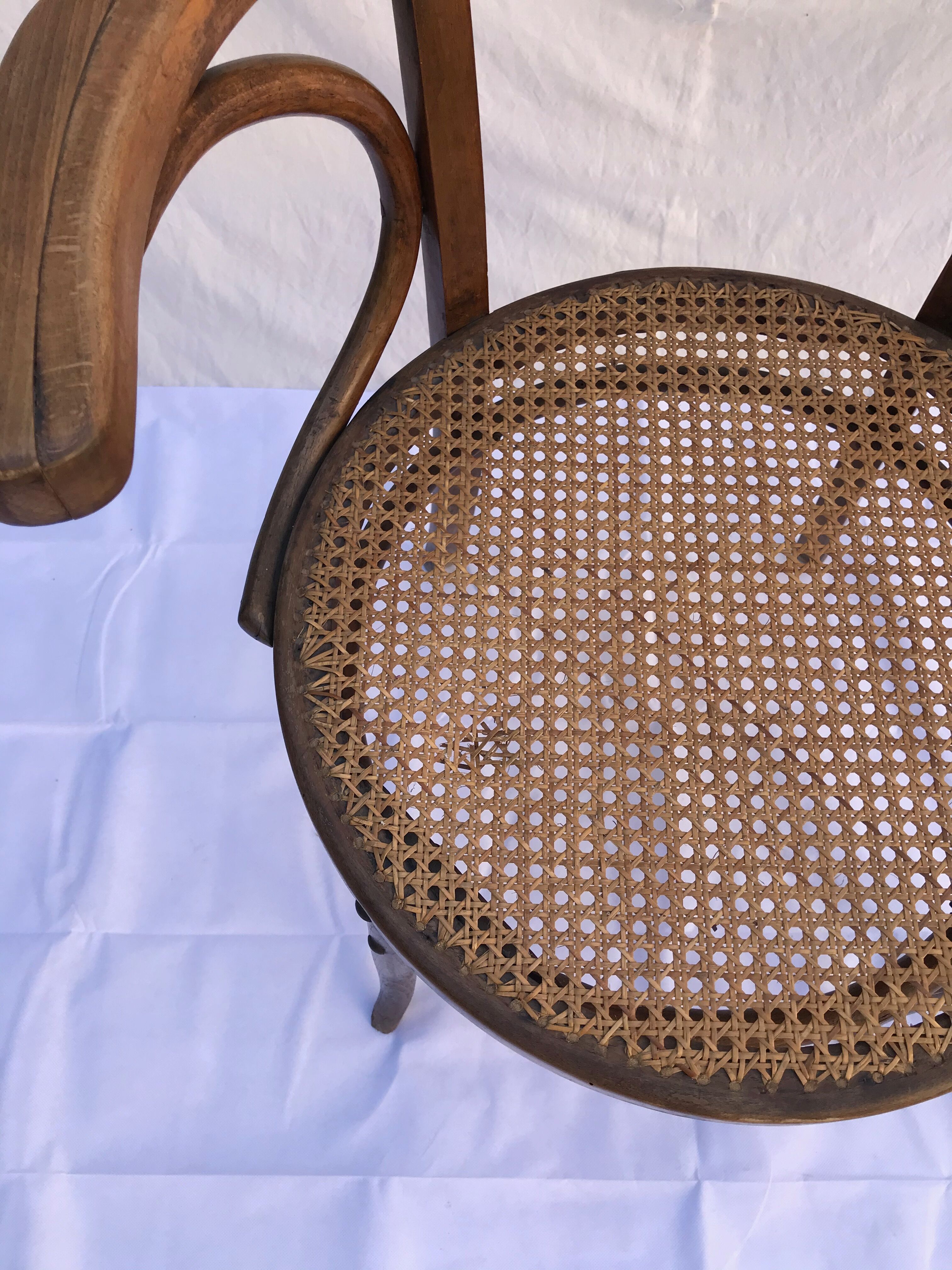 Former Baumann canne armchair