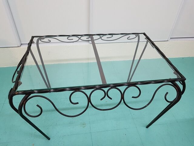 Wrought iron and glass coffee table