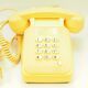 Vintage beige phone with keys