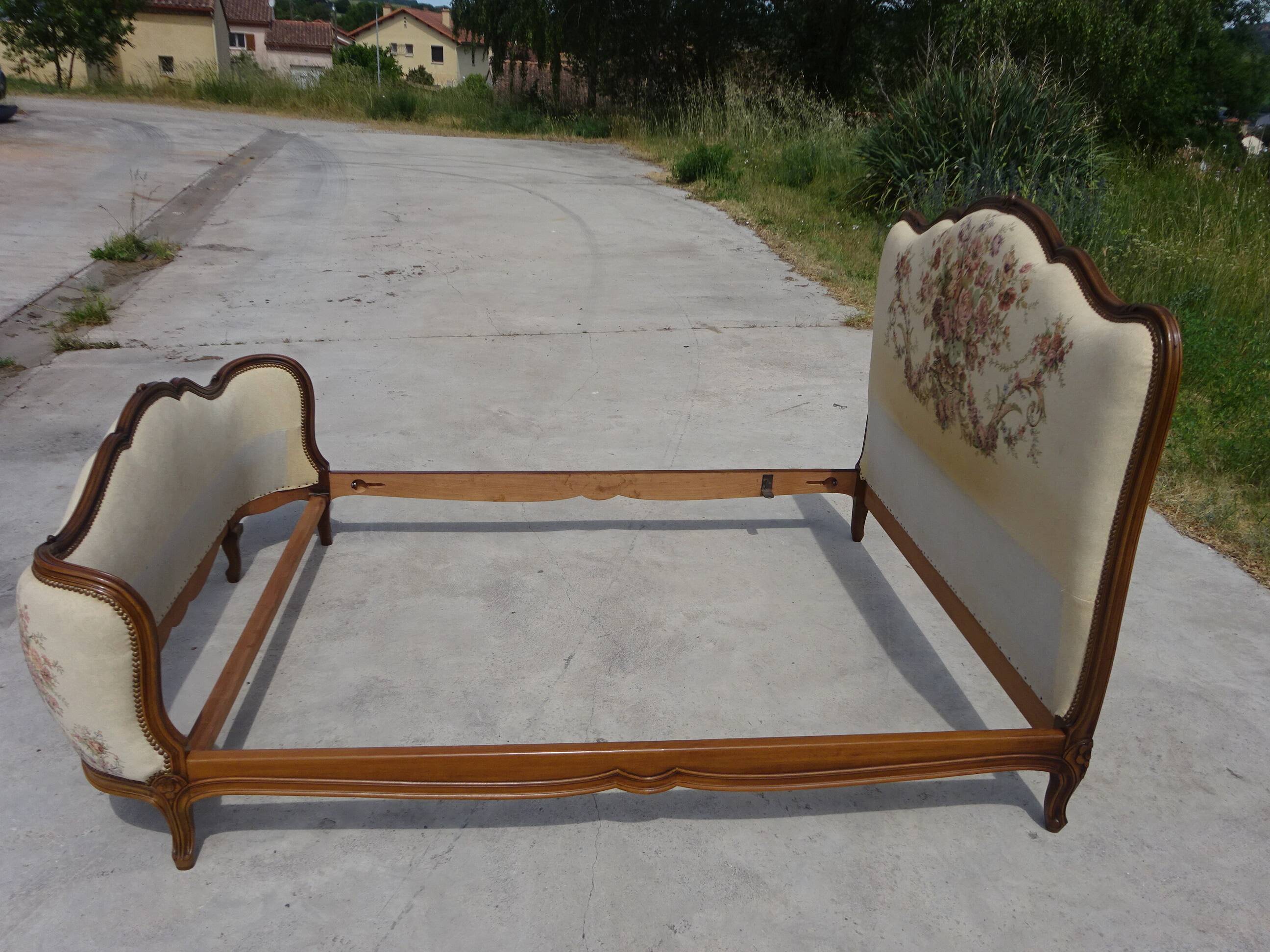 Solid wood bed frame with Jacquard fabric.