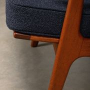 Pair Scandinavian Modern armchairs in teak and dark blue bouclé fabric